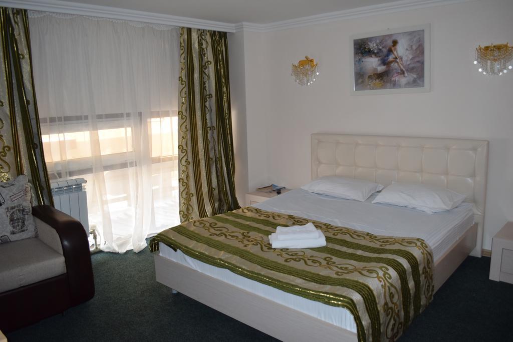 Bayterek Hotel Astana Oda fotoğraf